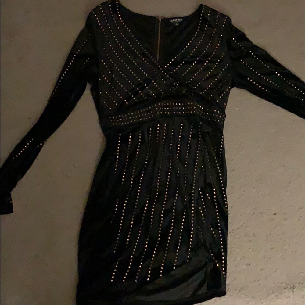 Black velvet dress with gold studs. Size 6 mini